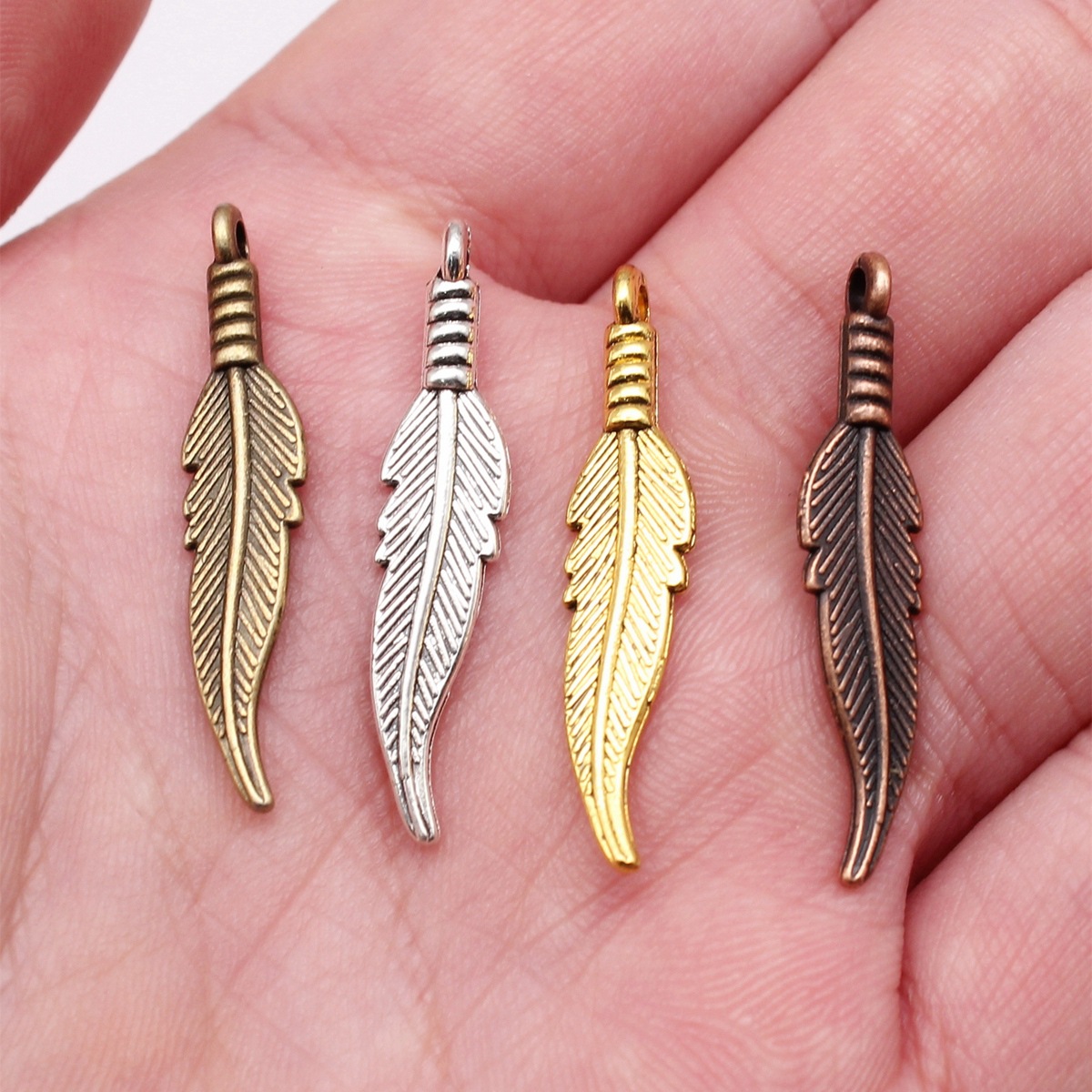 Hollow Feather Charm Leaf Char - Vintage Fashion Blog ulasan dan harga