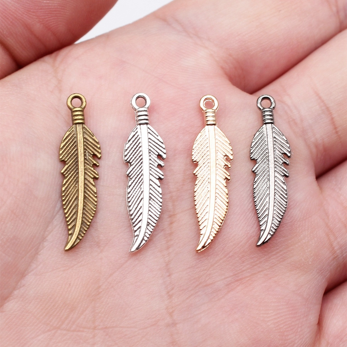 Hollow Feather Charm Leaf Char - Vintage Fashion Blog ulasan dan harga